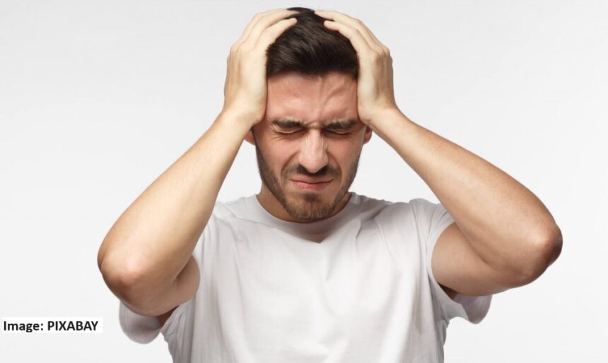 alt="a man suffering from depression"