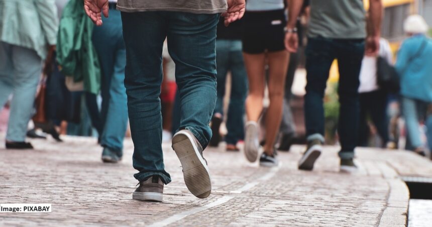 alt="people walking"
