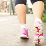 alt="walking lowers cancer risk"