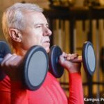 alt="old man weight training"
